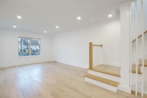 a view of entryway with wooden floor