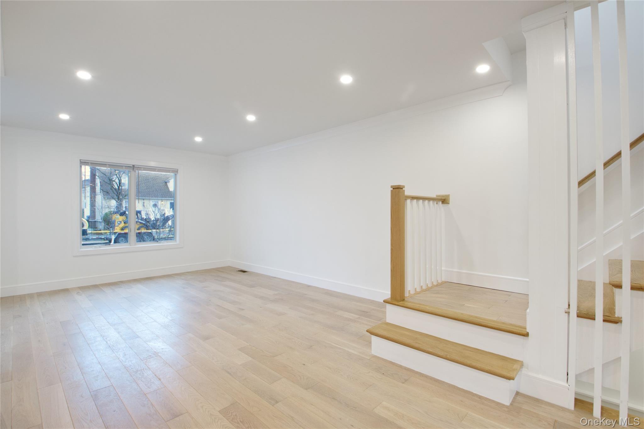 56 Kirkwood Road Port Washington, NY 11050 - Photo 7 of 46 a view of entryway with wooden floor
