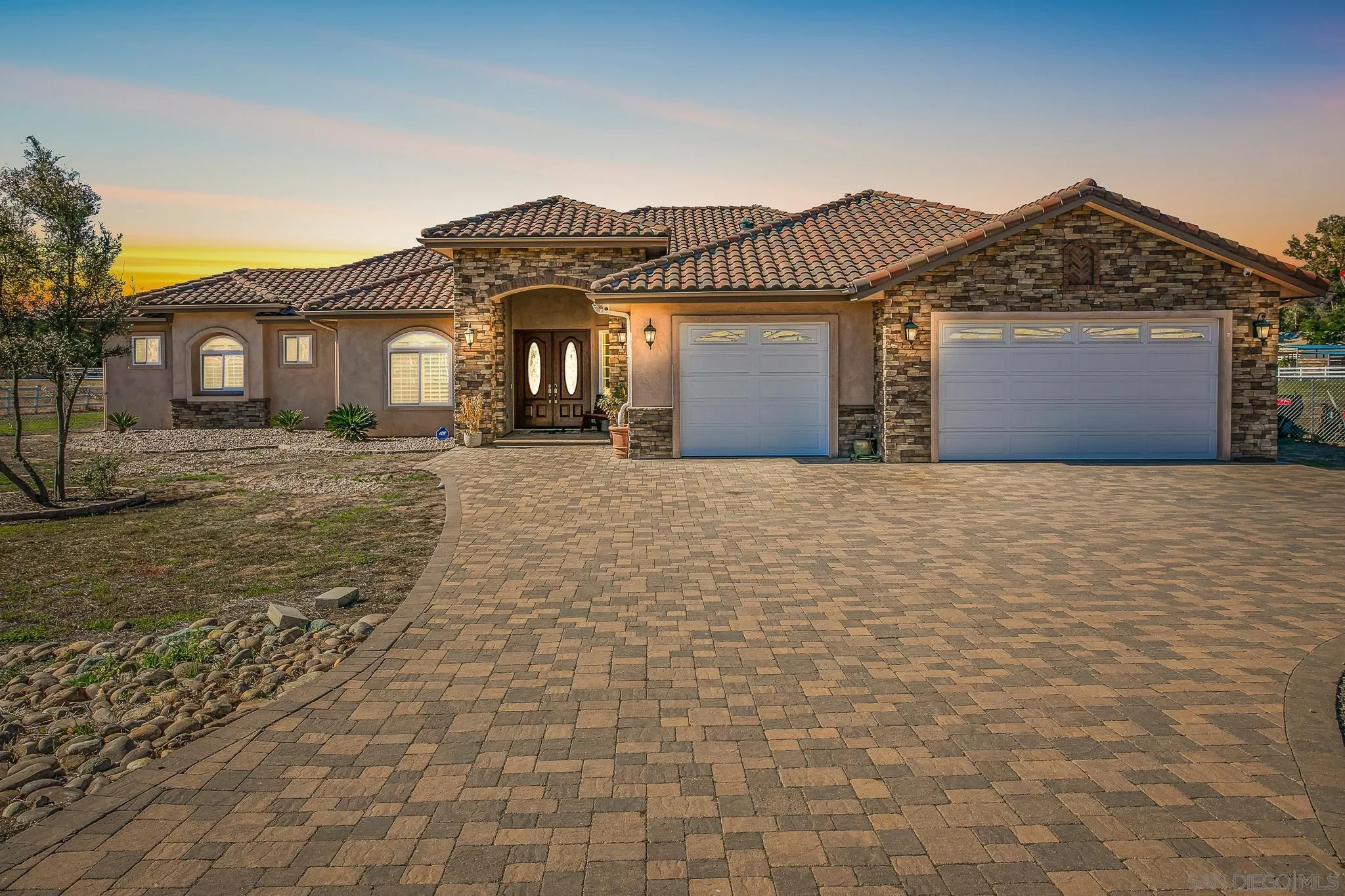 1090 Heritage Ranch Road Ramona, CA 92065 - Photo 1 of 49 a front view of a house with a yard