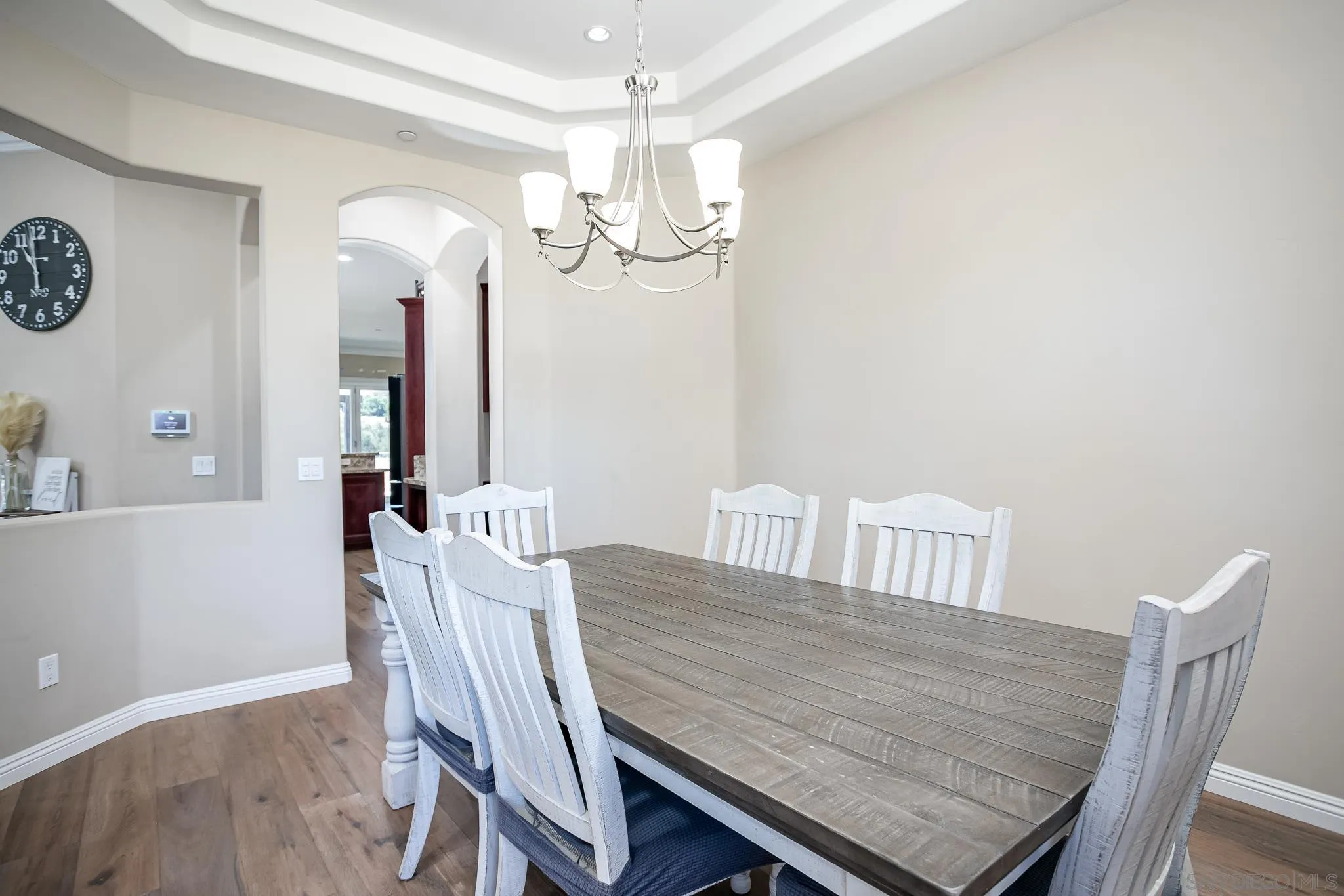 1090 Heritage Ranch Road Ramona, CA 92065 - Photo 15 of 49 a view of a dining room with furniture and a chandelier