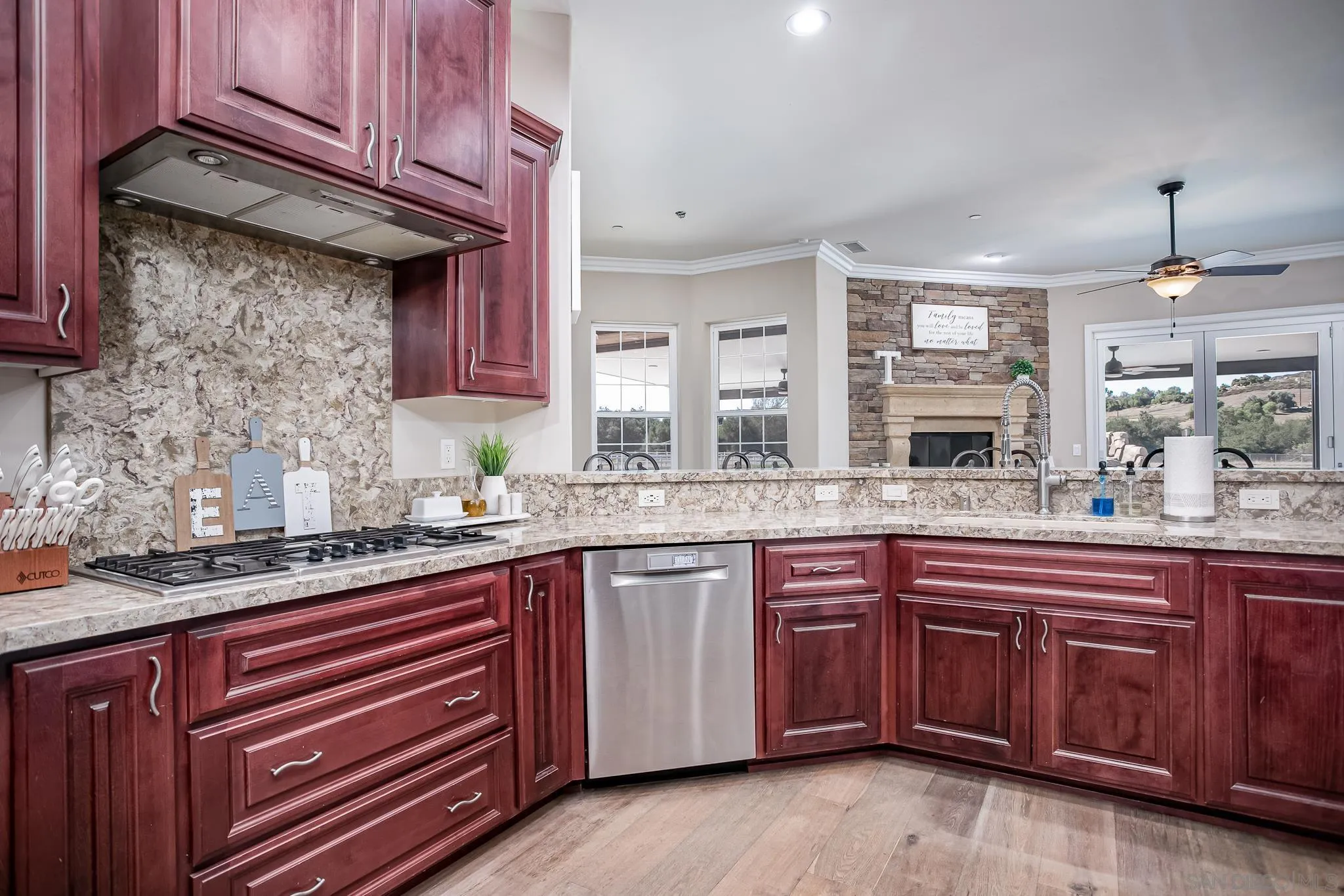 1090 Heritage Ranch Road Ramona, CA 92065 - Photo 16 of 49 a kitchen with a sink and cabinets