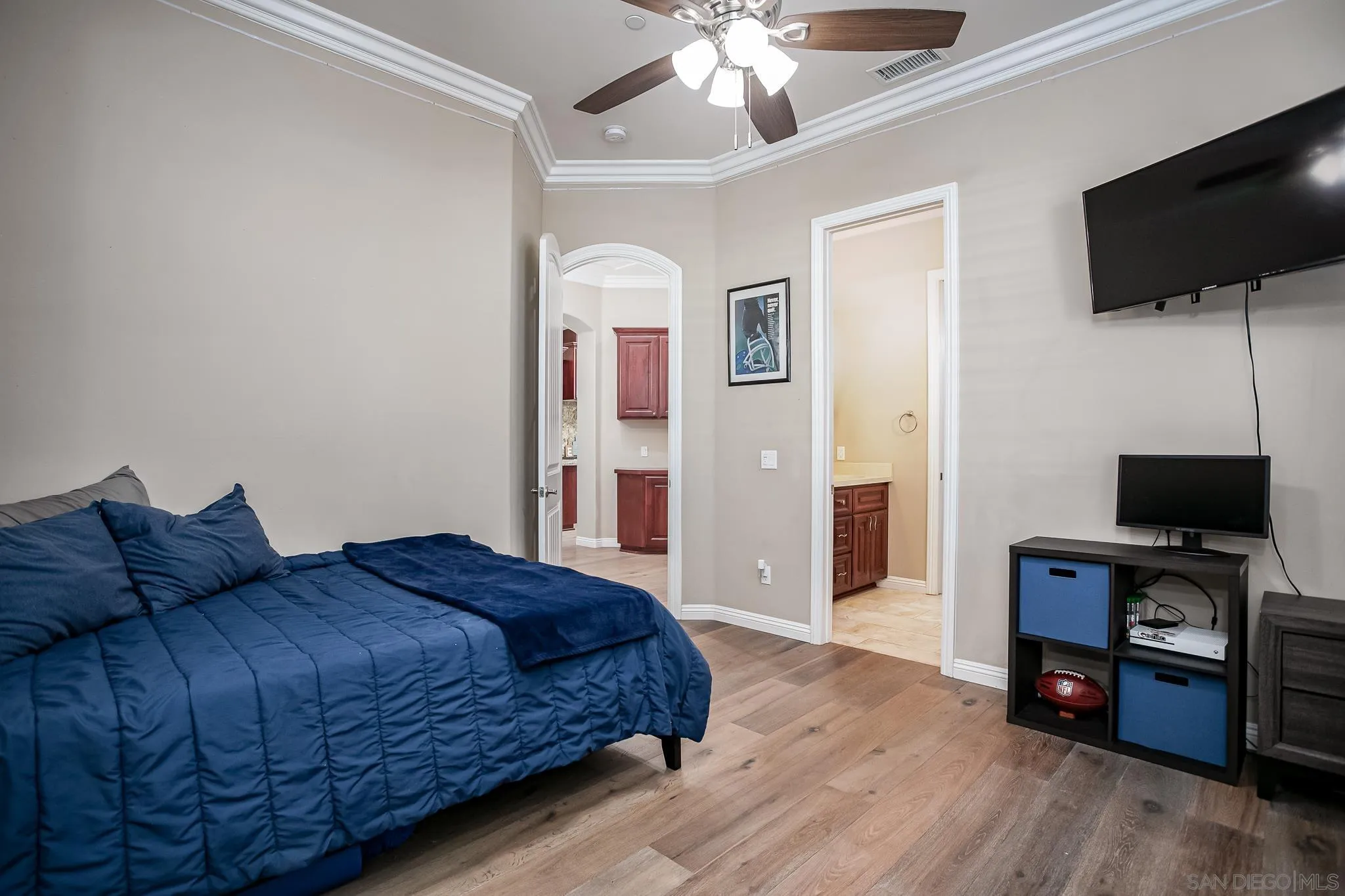 1090 Heritage Ranch Road Ramona, CA 92065 - Photo 26 of 49 a bedroom with a bed and a flat screen tv