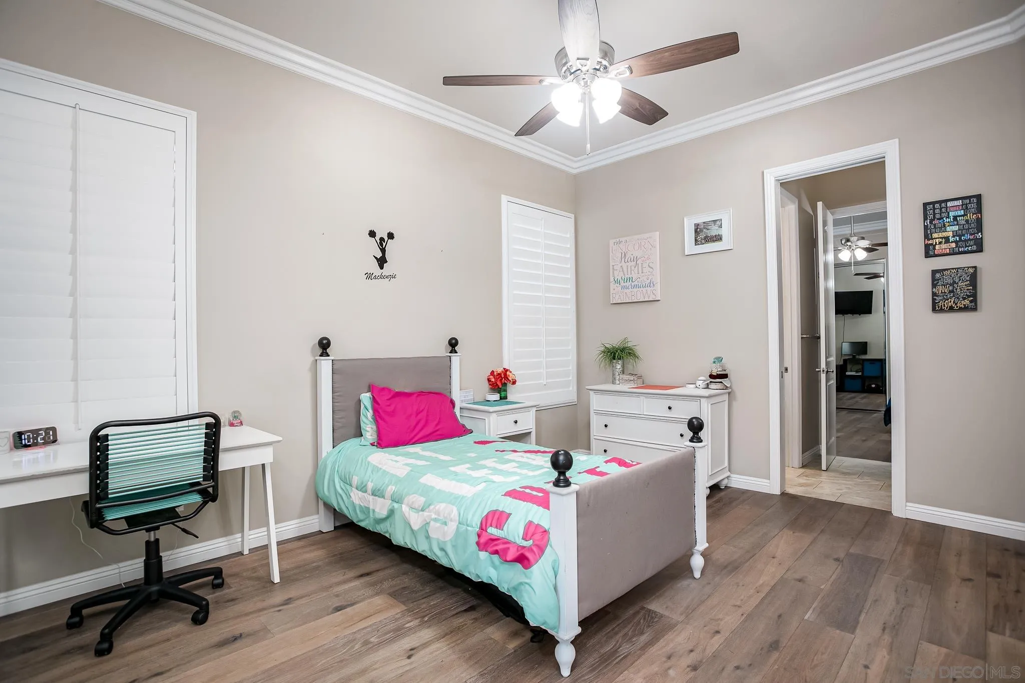 1090 Heritage Ranch Road Ramona, CA 92065 - Photo 28 of 49 a bedroom with a bed and a chandelier