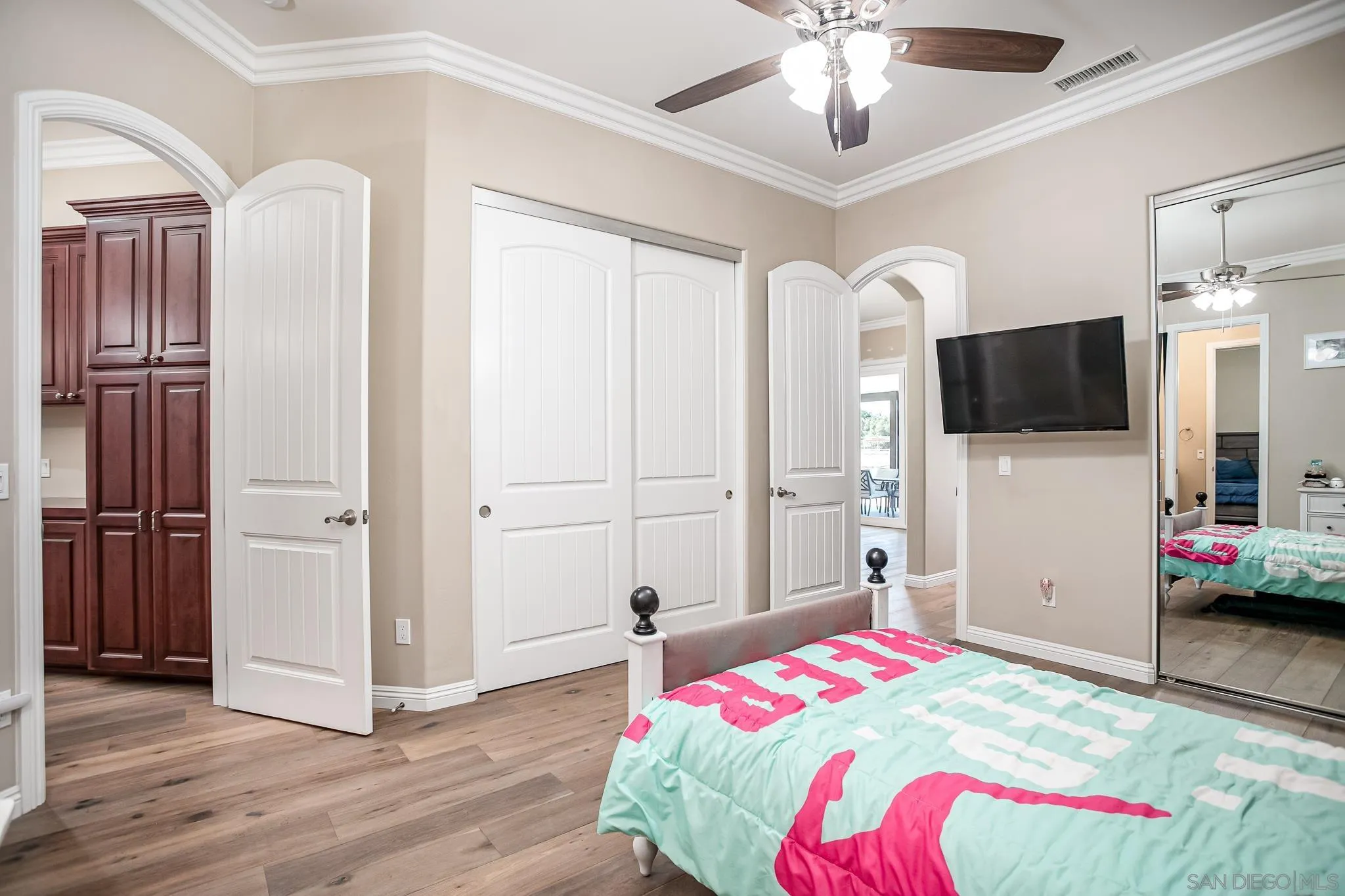 1090 Heritage Ranch Road Ramona, CA 92065 - Photo 29 of 49 a bedroom with bed and a flat tv screen on dresser