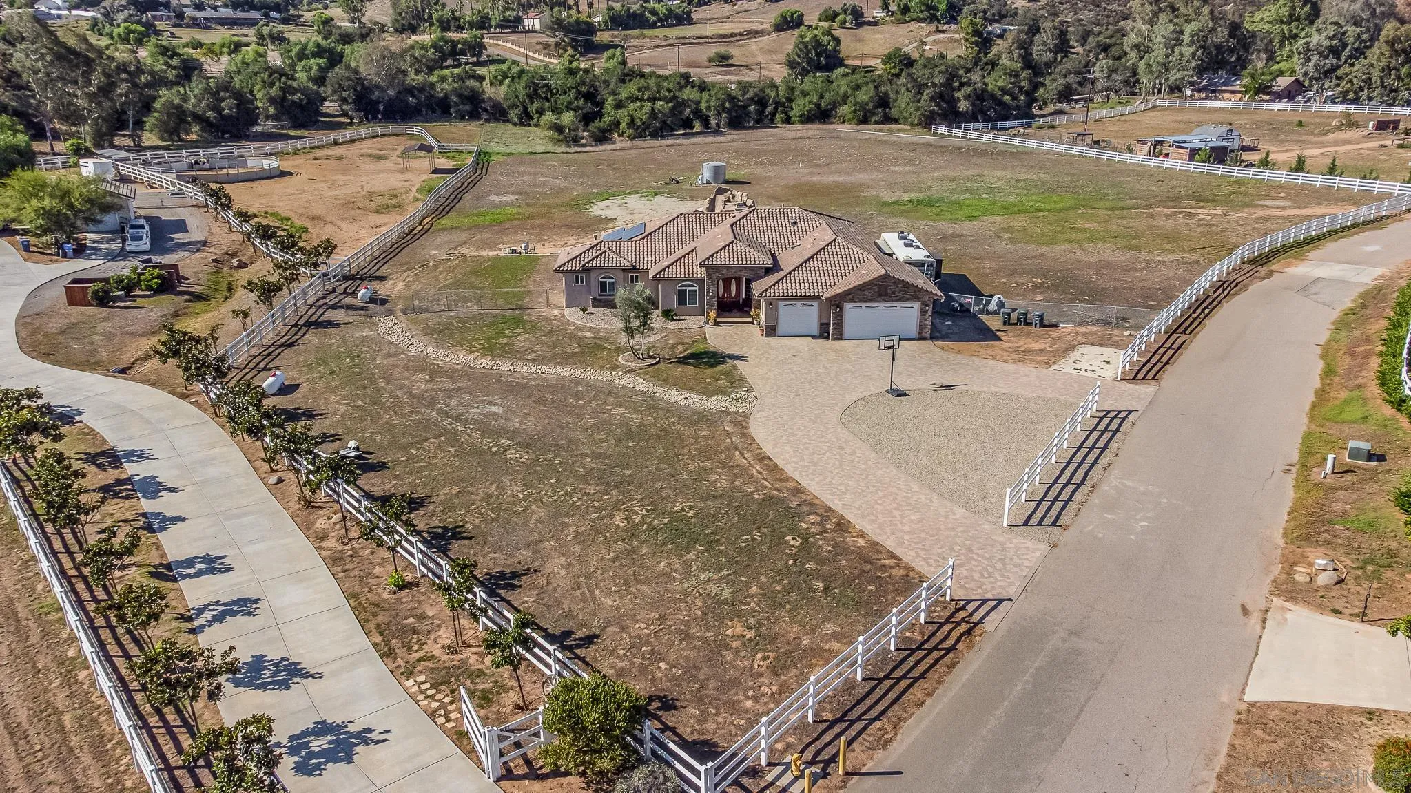 1090 Heritage Ranch Road Ramona, CA 92065 - Photo 3 of 49 an aerial view of residential houses with outdoor space
