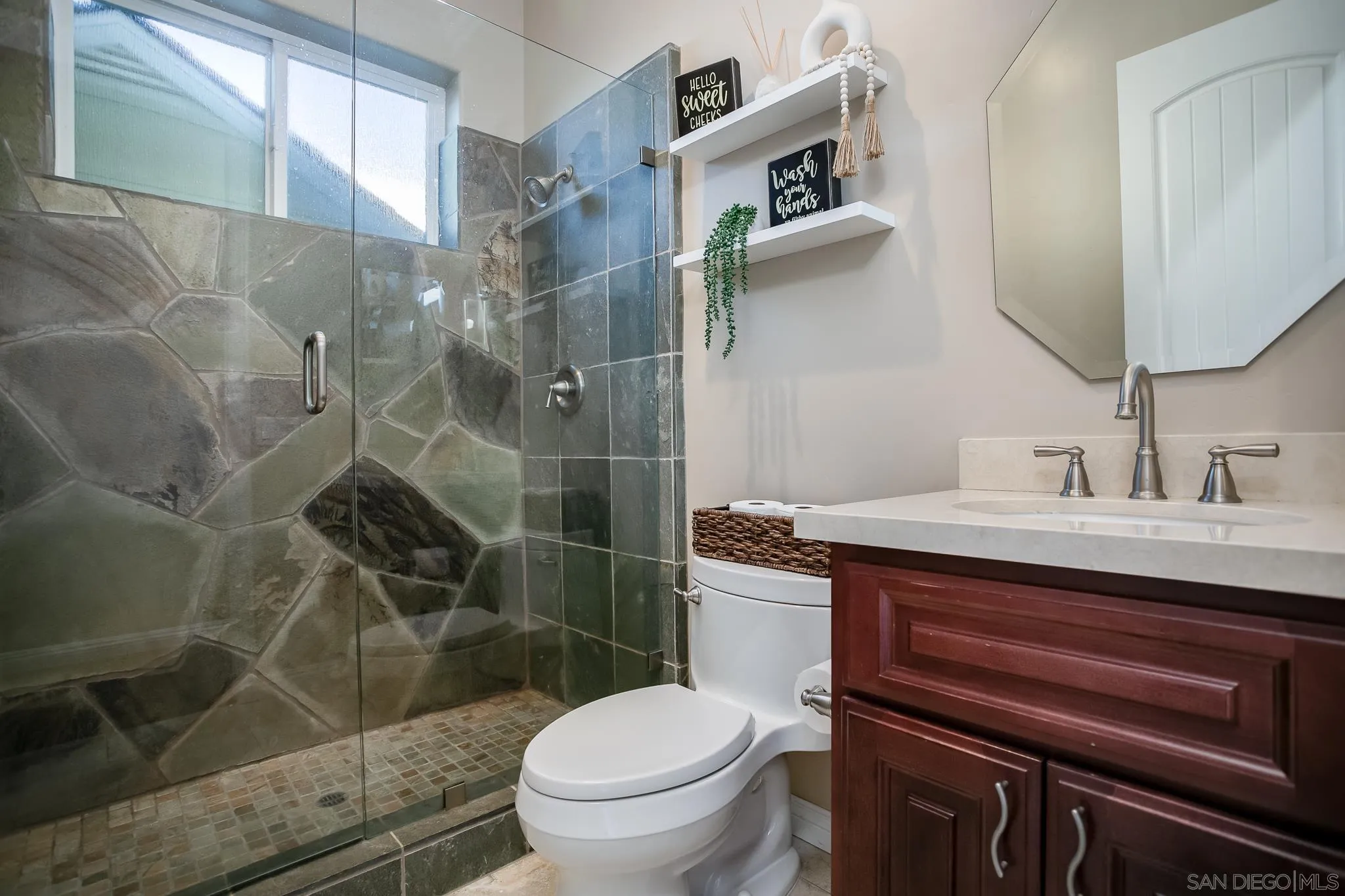1090 Heritage Ranch Road Ramona, CA 92065 - Photo 31 of 49 a bathroom with a sink toilet and shower
