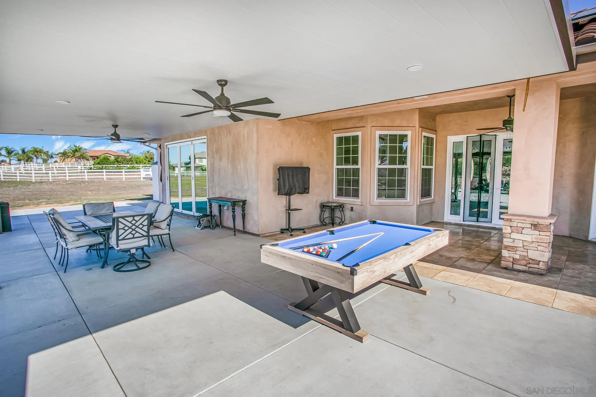 1090 Heritage Ranch Road Ramona, CA 92065 - Photo 33 of 49 a living room with furniture a floor and pool table