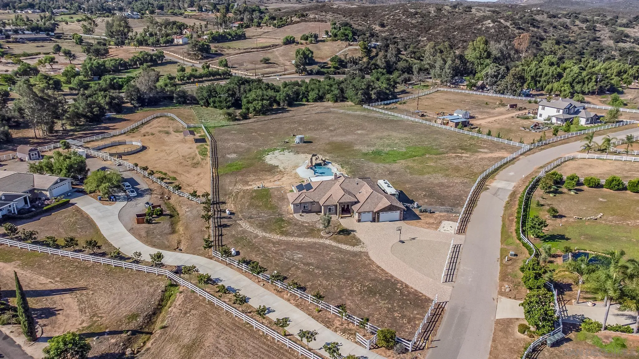 1090 Heritage Ranch Road Ramona, CA 92065 - Photo 4 of 49 an aerial view of a swimming pool
