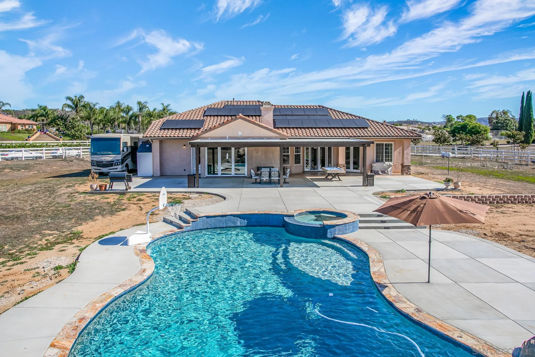 1090 Heritage Ranch Road Ramona, CA 92065 - Photo 41 of 49 a view of a house with pool and chairs