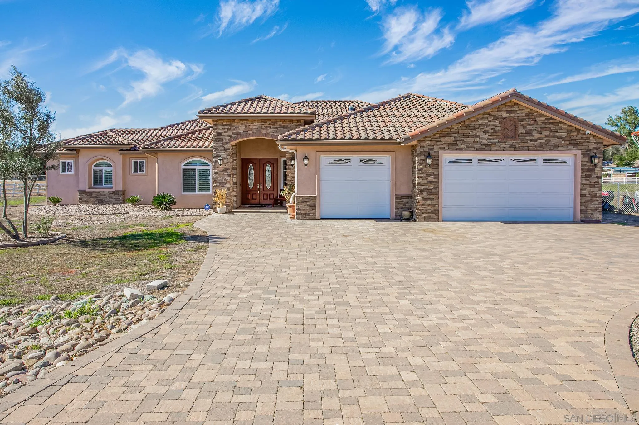1090 Heritage Ranch Road Ramona, CA 92065 - Photo 5 of 49 a front view of a house with a yard