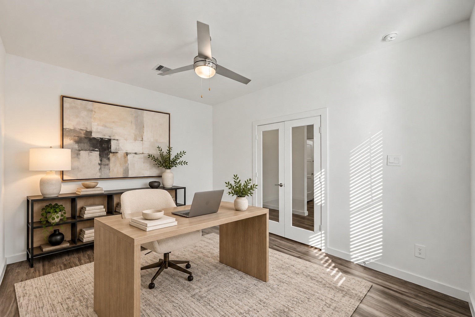 14162 Primrose Ridge Lane Conroe, TX 77384 - Photo 8 of 48 Elevate your productivity in this beautifully staged home office, featuring sleek modern furnishings, abundant natural light, and a calming palette for an inspiring workspace.