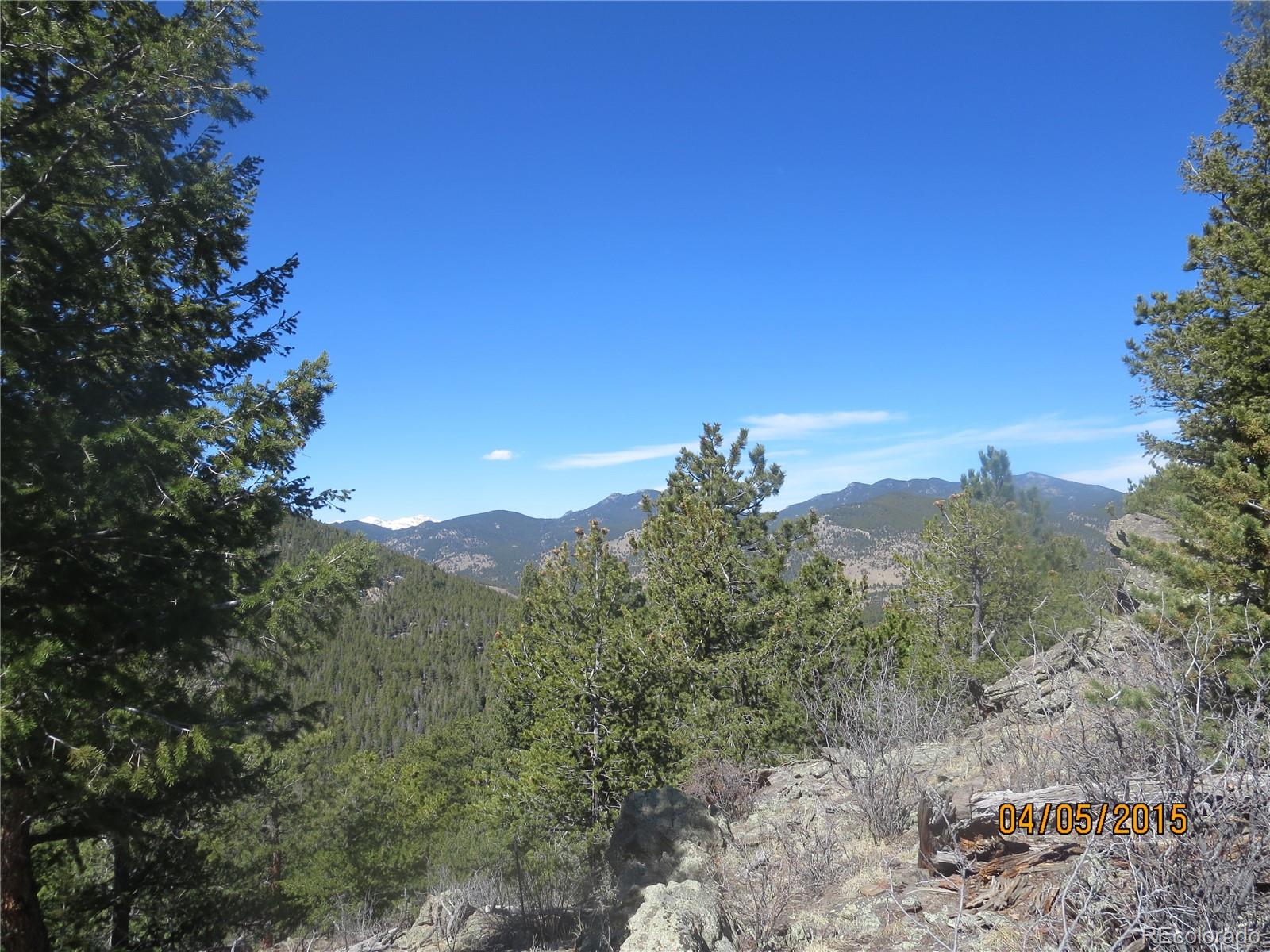 8077 Drew Hill Road Golden, CO 80403 - Photo 3 of 6 a view of a mountain
