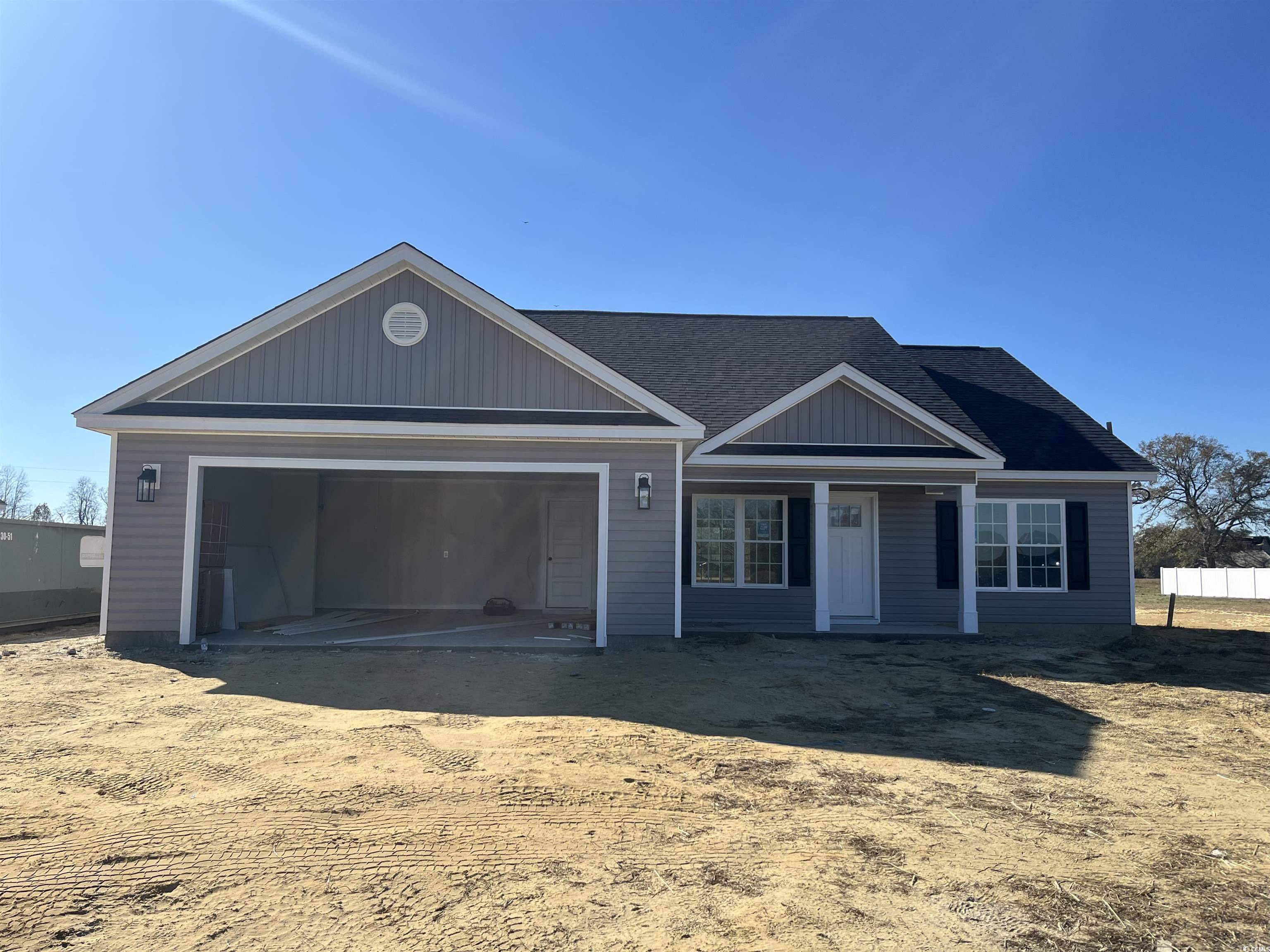 8197 Kerl Road Aynor, SC 29511 - Photo 2 of 9 View of front of property featuring a garage