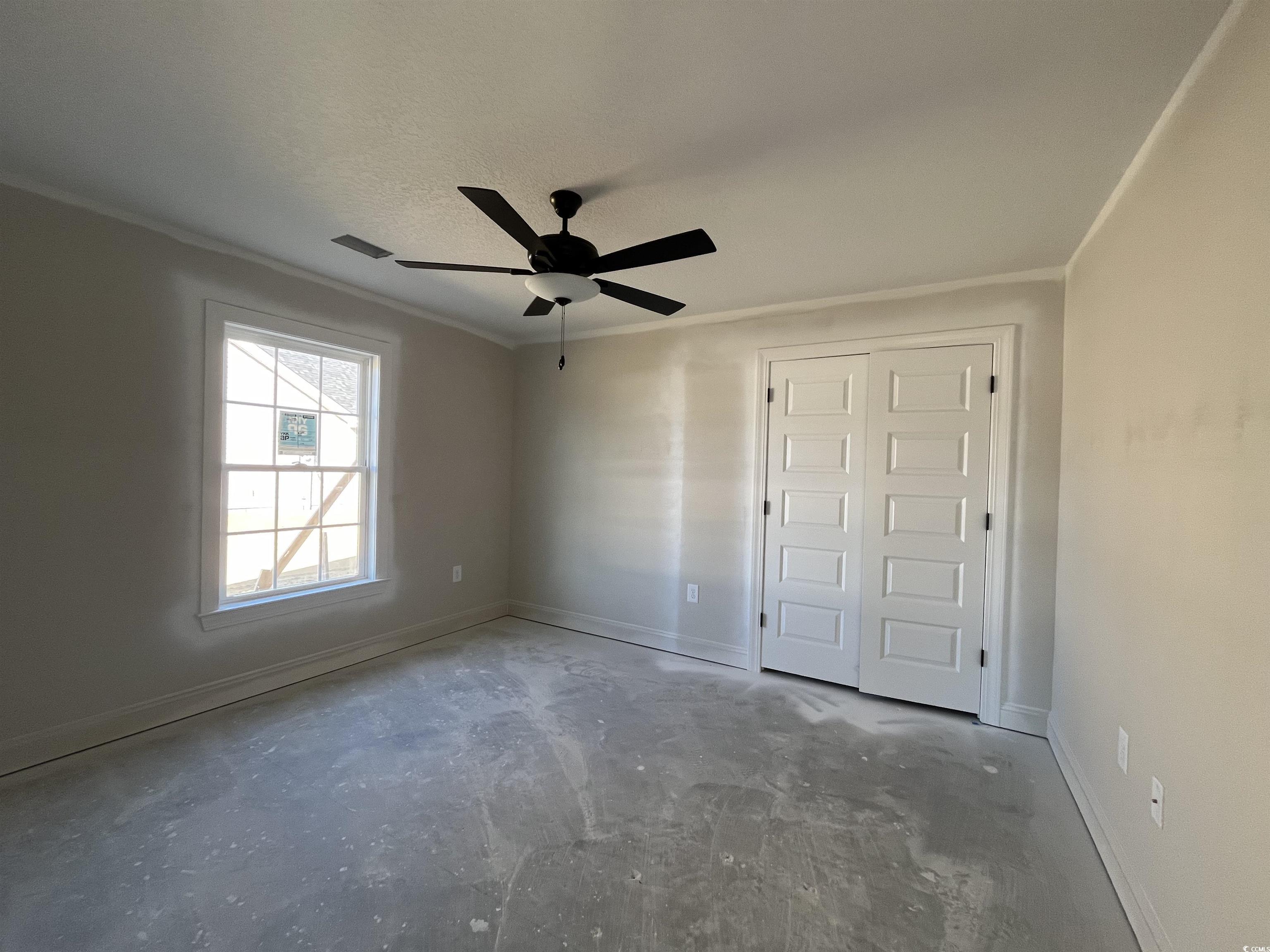 8197 Kerl Road Aynor, SC 29511 - Photo 5 of 9 Unfurnished bedroom featuring a textured ceiling,