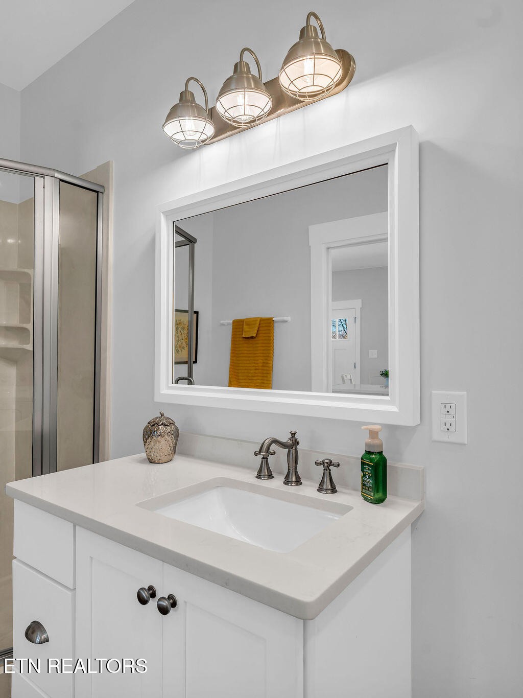 660 Mize Circle Seymour, TN 37865 - Photo 20 of 46 a bathroom with a sink and a mirror