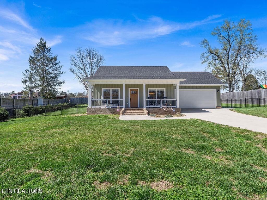 660 Mize Circle Seymour, TN 37865 - Photo 2 of 46 a front view of a house with yard and green space