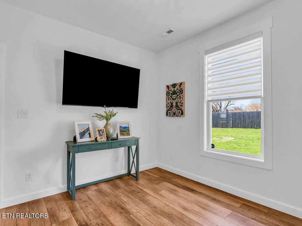 660 Mize Circle Seymour, TN 37865 - Photo 23 of 46 a living room with flat screen tv painted walls and a window