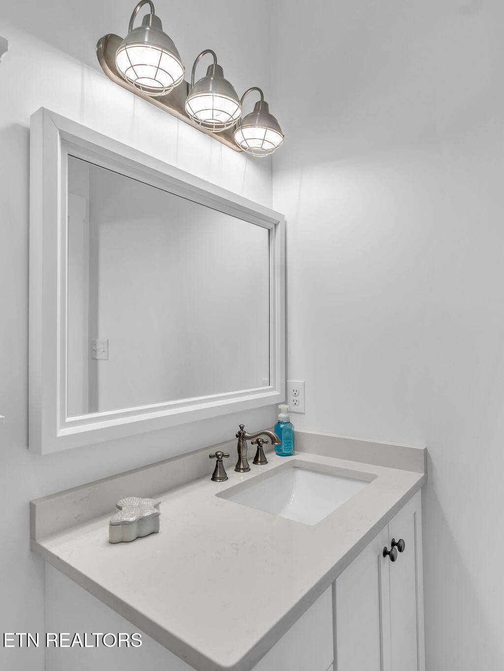 660 Mize Circle Seymour, TN 37865 - Photo 27 of 46 a bathroom with a sink and a mirror