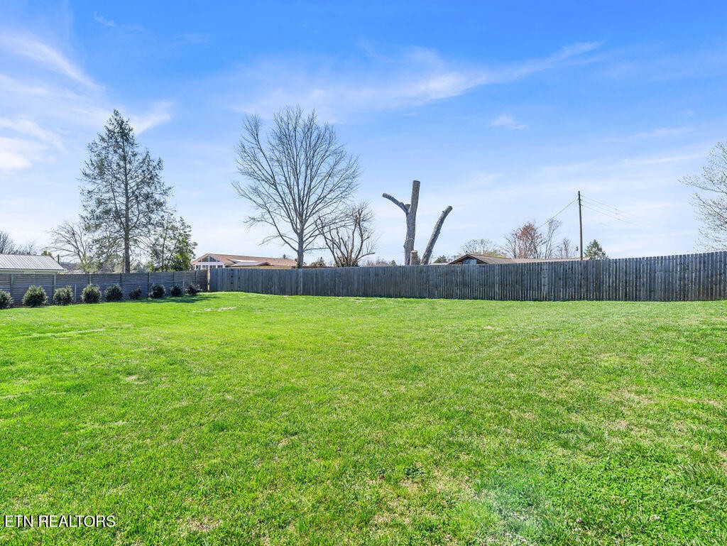 660 Mize Circle Seymour, TN 37865 - Photo 33 of 46 a view of yard with grass and trees