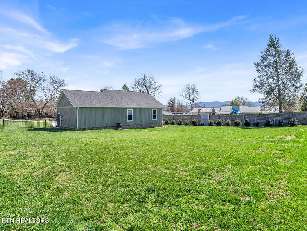 660 Mize Circle Seymour, TN 37865 - Photo 35 of 46 a aerial view of a house with a big yard potted plants and large tree