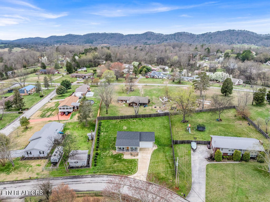 660 Mize Circle Seymour, TN 37865 - Photo 37 of 46 an aerial view of green landscape with trees houses and mountain view