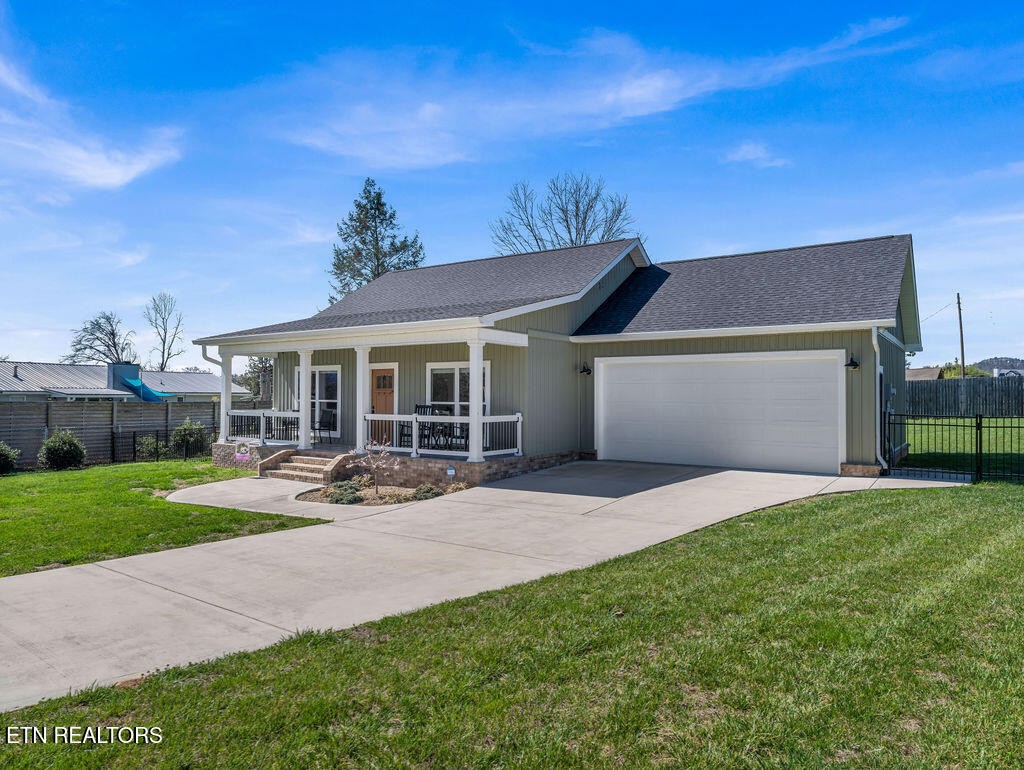 660 Mize Circle Seymour, TN 37865 - Photo 4 of 46 a front view of a house with patio and garden