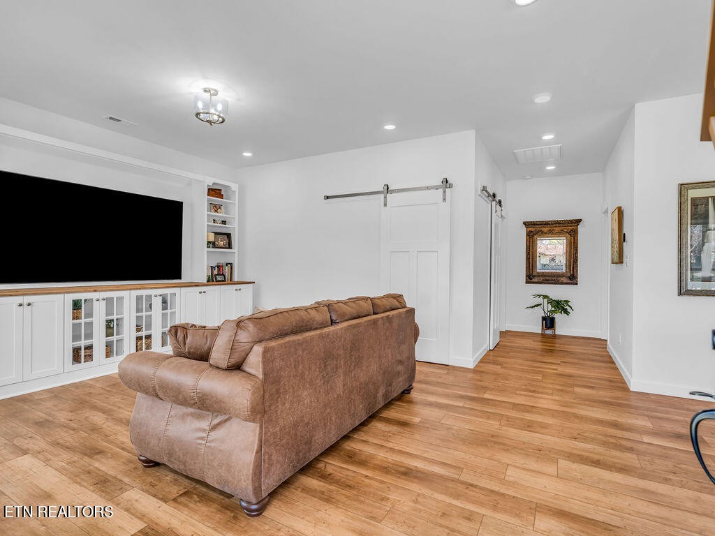660 Mize Circle Seymour, TN 37865 - Photo 7 of 46 a living room with furniture and a flat screen tv