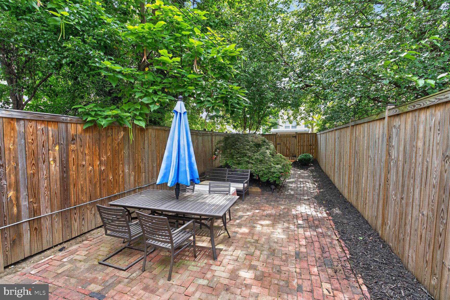 641 11th Street Northeast Washington, DC 20002 - Photo 19 of 22 Secluded garden retreat with greenery.