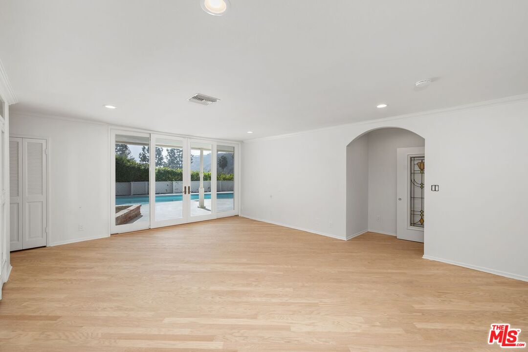 1700 Rising Glen Road Los Angeles, CA 90069 - Photo 10 of 19 a view of an empty room with a window