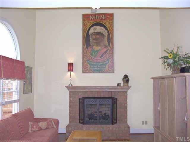 2500 Diamondhitch Trail Raleigh, NC 27615 - Photo 5 of 10 Family room has masonry fire-place with gas logs.