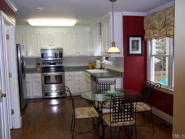 2500 Diamondhitch Trail Raleigh, NC 27615 - Photo 9 of 10 Kitchen with breakfast nook open to family room.