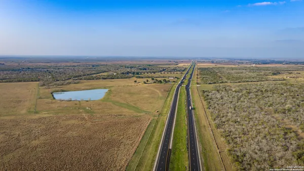 a garden view with a fountain