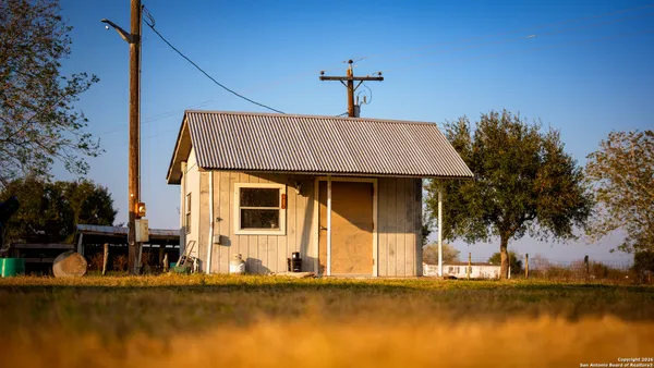 a view of a lounge chairs in the patio