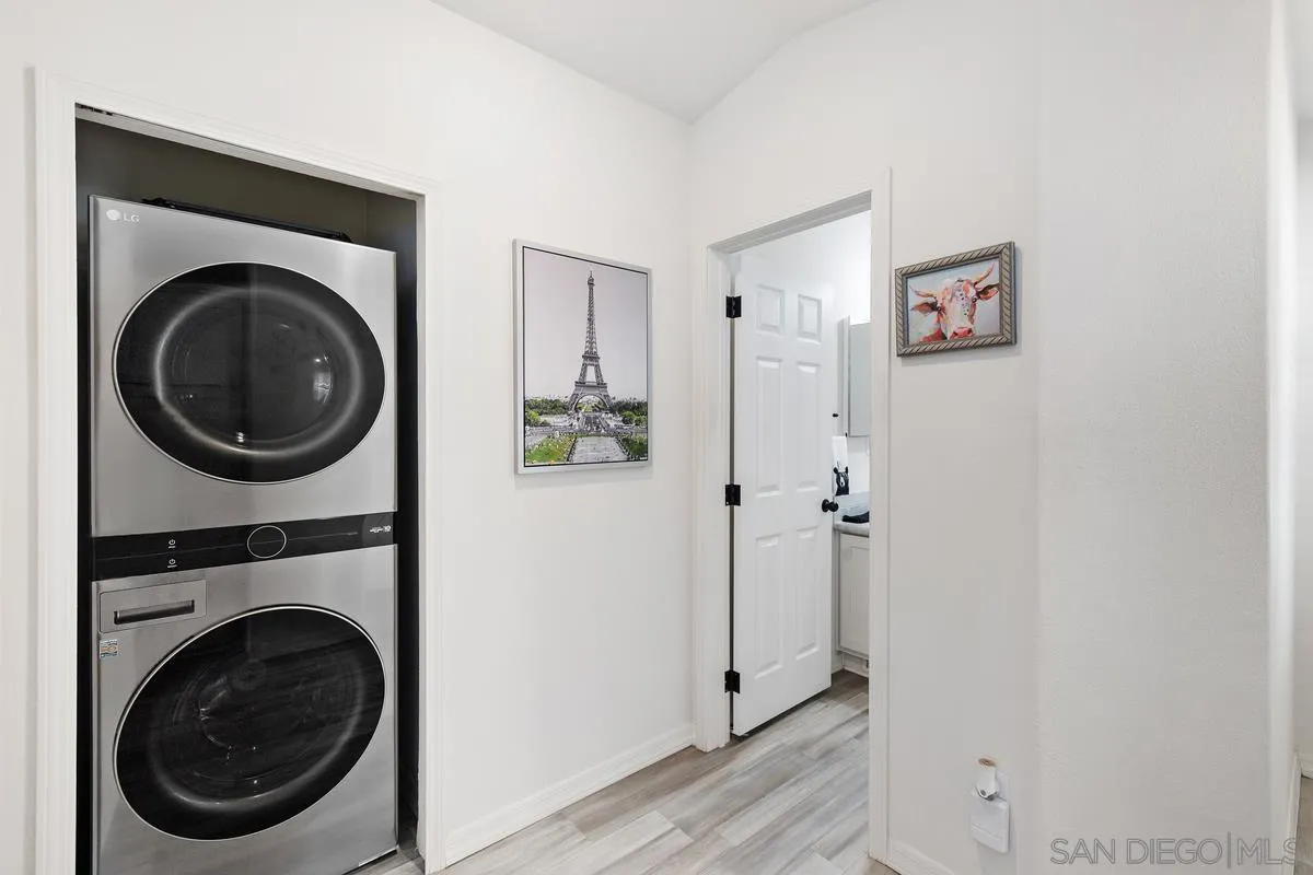 8545 Mission Gorge Road, Unit SPC 336A Santee, CA 92071 - Photo 14 of 28 a view of a hallway with washer and dryer