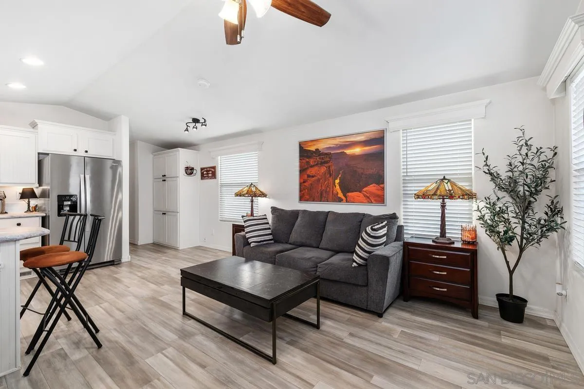 8545 Mission Gorge Road, Unit SPC 336A Santee, CA 92071 - Photo 7 of 28 a living room with furniture and a potted plant