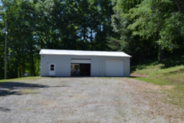 318 Rock Springs Road Celina, TN 38551 - Photo 50 of 87 a view of an outdoor space and a yard