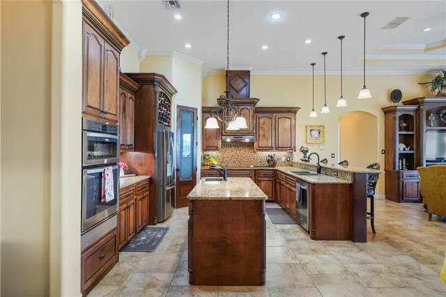 $699,900 | 8401 Lago Vista Drive, Corpus Christi, TX 78414