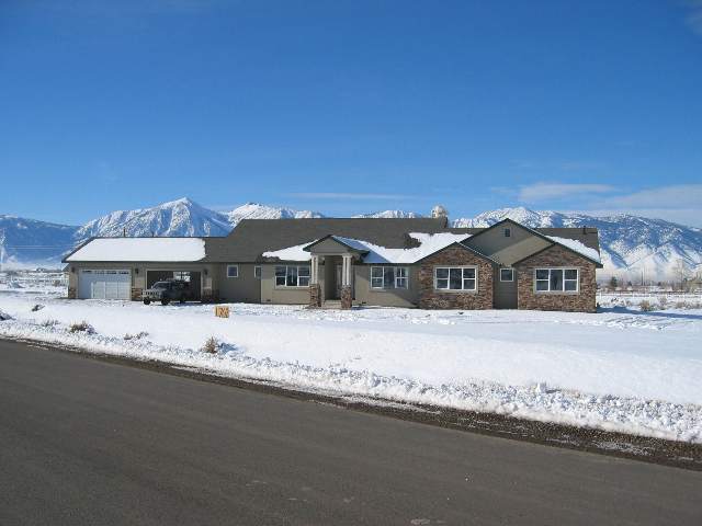 1702 North Benton Road Minden, NV 89423 - Photo 1 of 1 a front view of a house with a yard