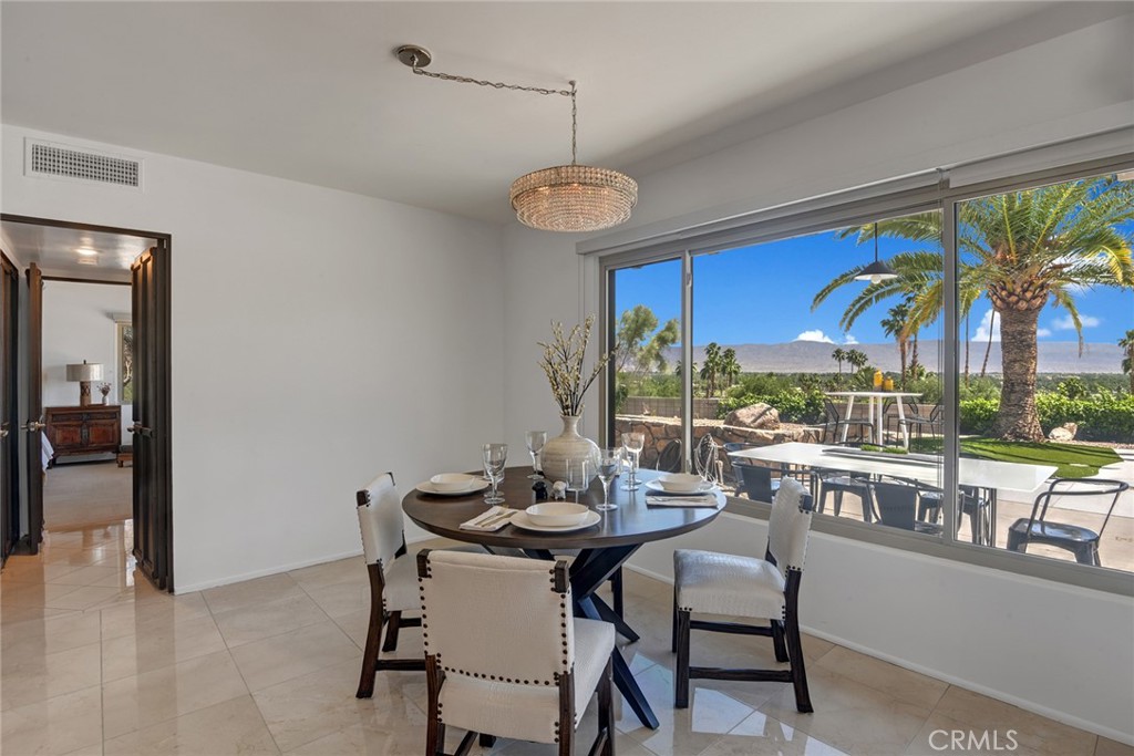 40600 Tonopah Road Rancho Mirage, CA 92270 - Photo 20 of 28 a view of a dining room with furniture window and outside view