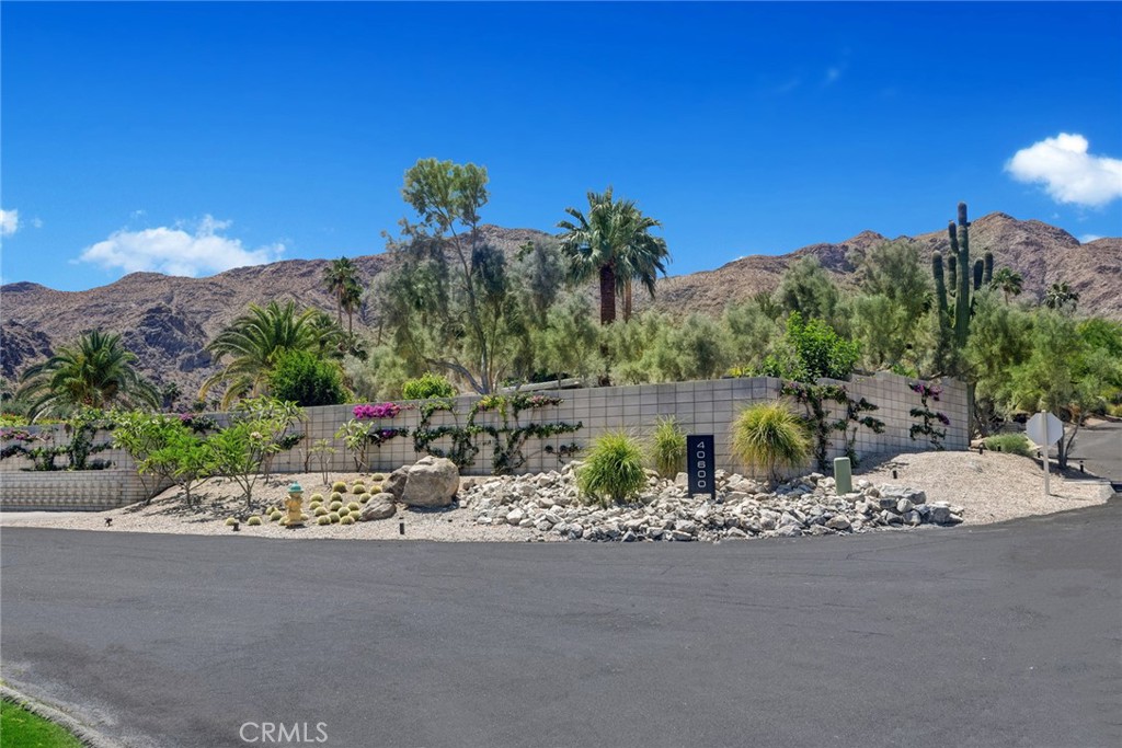 40600 Tonopah Road Rancho Mirage, CA 92270 - Photo 6 of 27 a view of a street with a building in the background