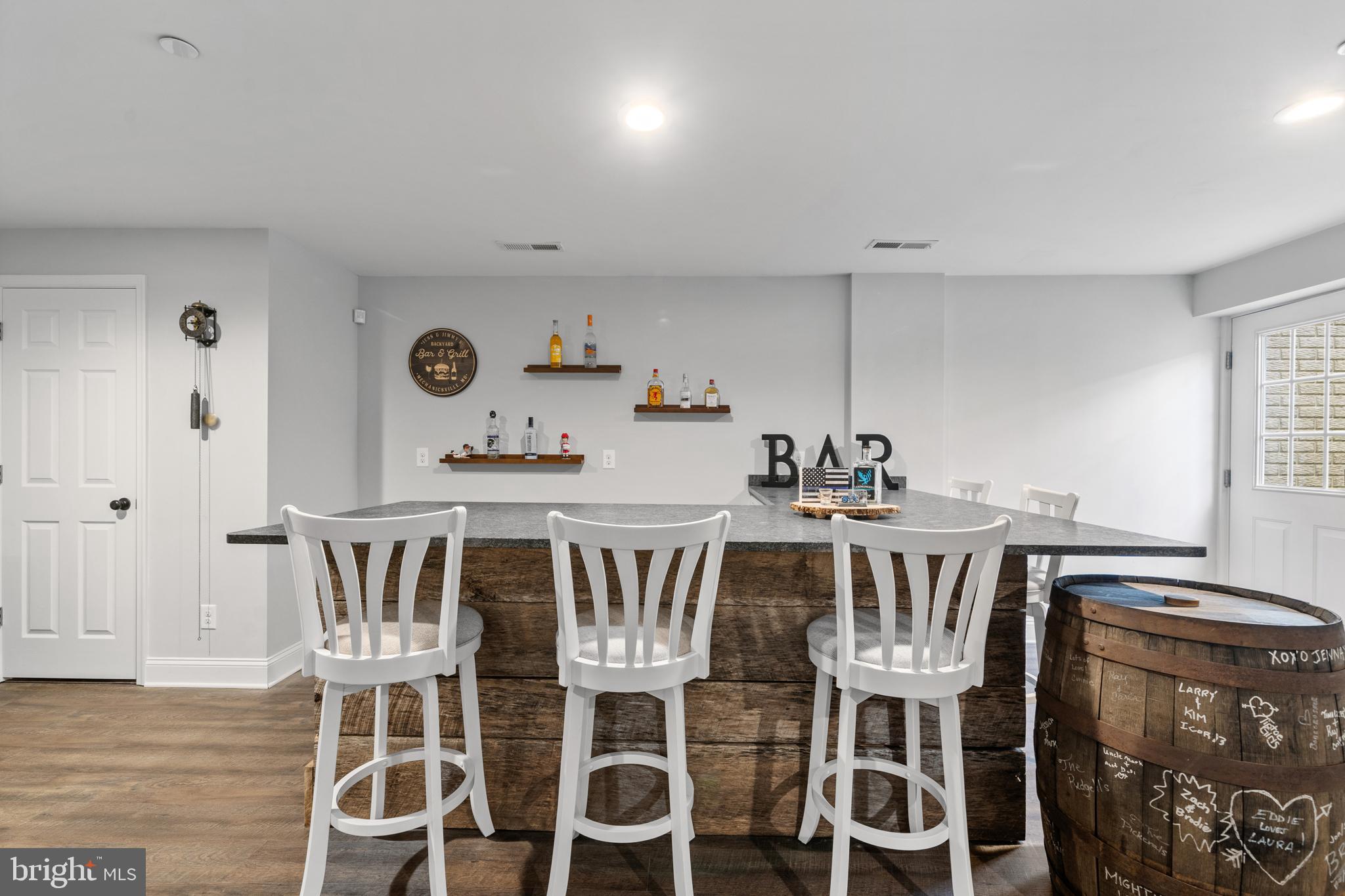 31505 Point Lookout Road Mechanicsville, MD 20659 - Photo 28 of 50 Full wet bar with drink fridge