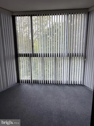 a view of a house with sitting area and garden