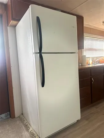 a kitchen with a stove and a microwave