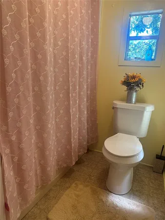 a bathroom with a sink vanity and mirror