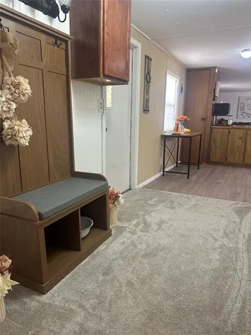 a bedroom with a bed and a table