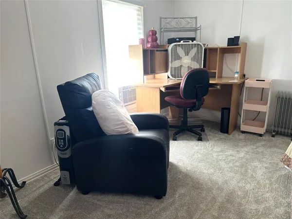 a view of kitchen dining room with wooden floor and window