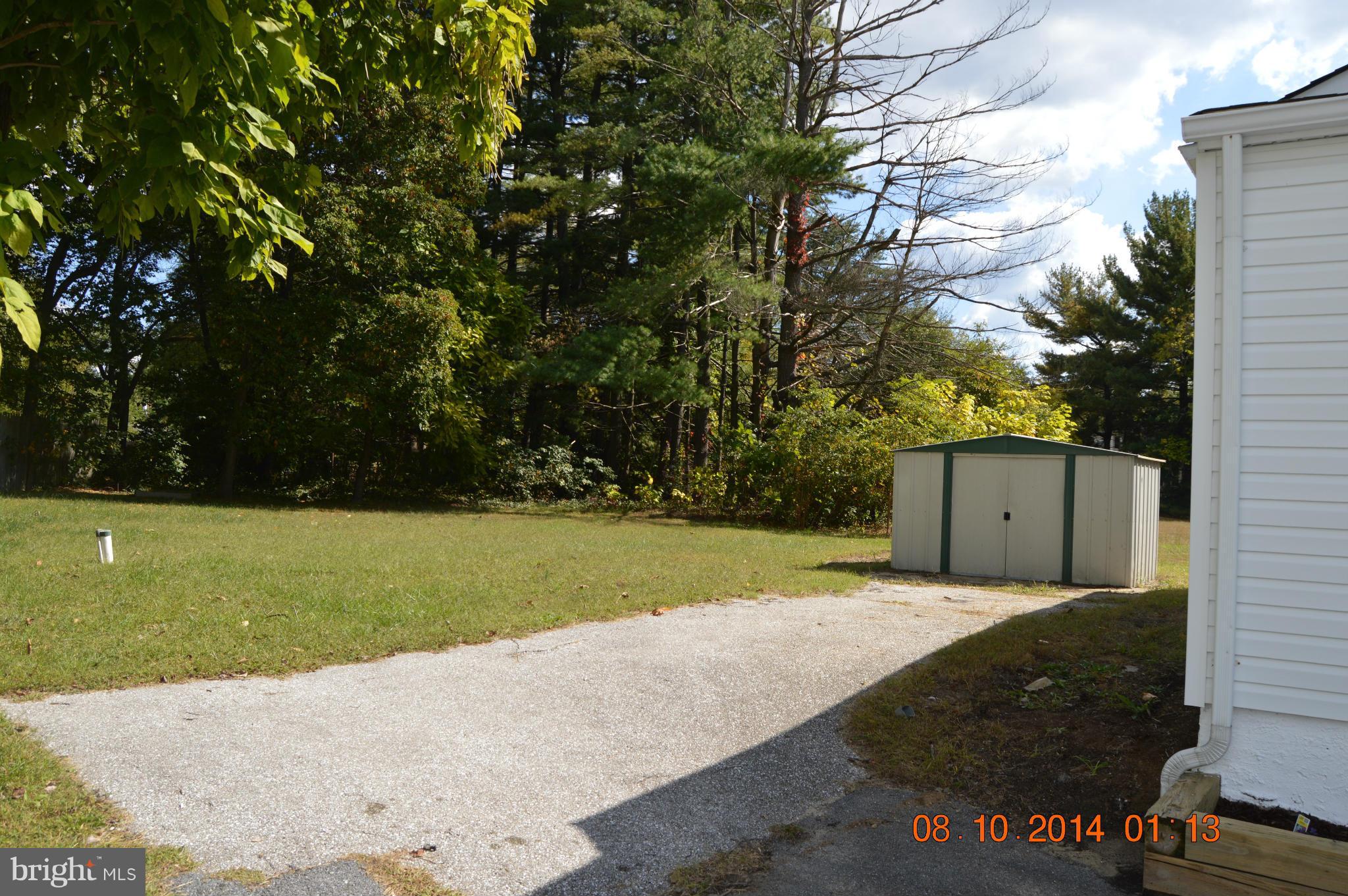 7 Burns Crossing Road Severn, MD 21144 - Photo 6 of 14 Patio area and shed