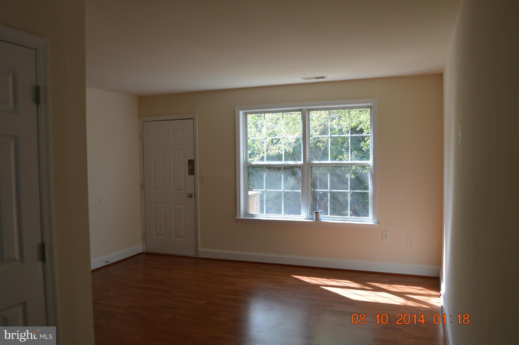 7 Burns Crossing Road Severn, MD 21144 - Photo 9 of 14 Laminate Floors in Living Rm.