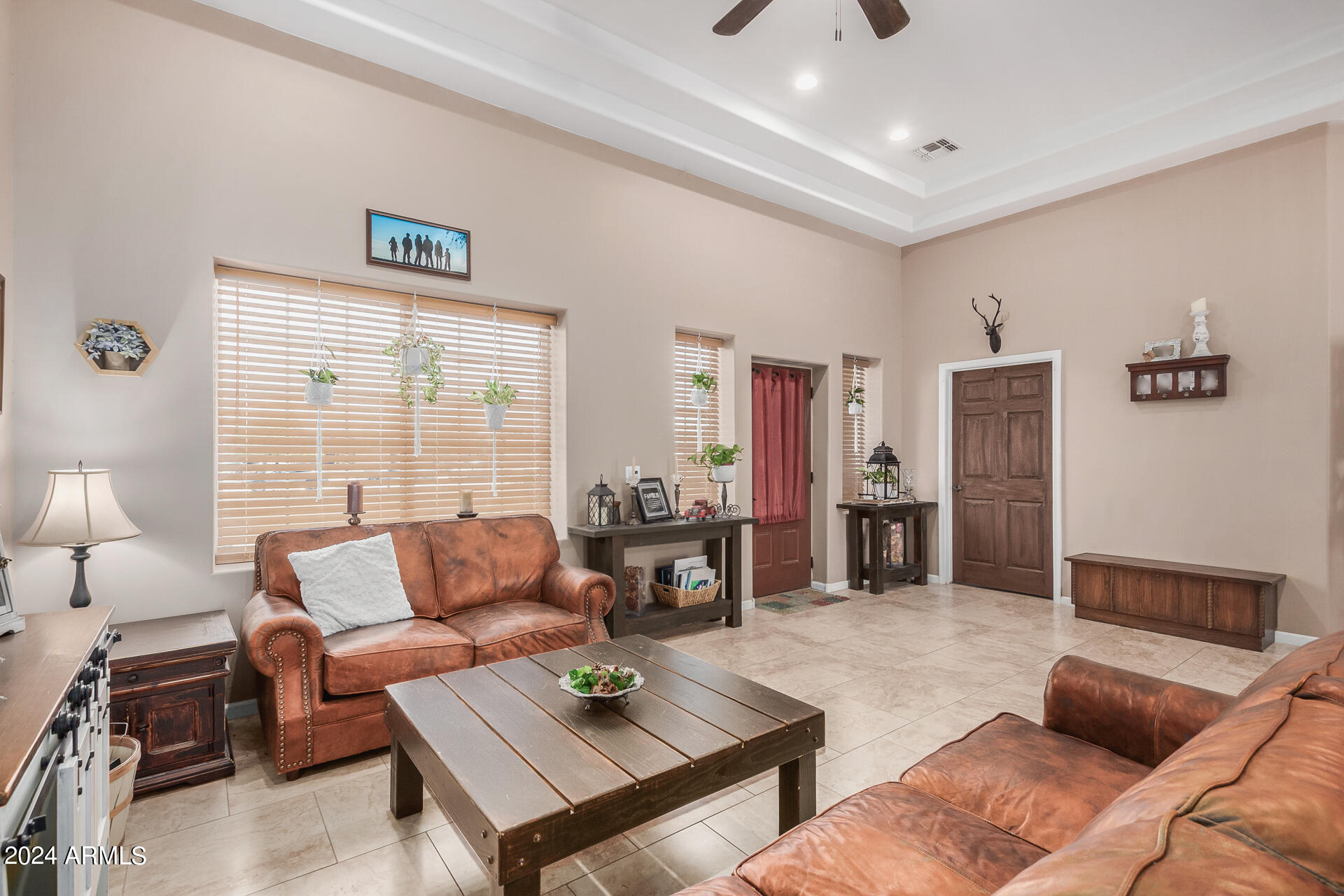 20716 West Telegram Path Road Buckeye, AZ 85326 - Photo 24 of 65 a living room with furniture and a large window