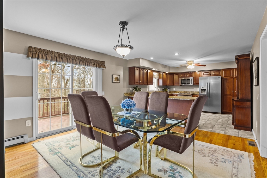 780 Dickinson Street Fall River, MA 02721 - Photo 17 of 42 a view of a dining room with furniture window and wooden floor